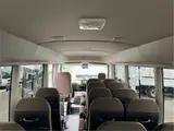 2026 Toyota Coaster GX25 passenger rear double doors automatic doors Silver Van for sale, Japanese used car export - photo 52 of 52 | GULJI TRADERS