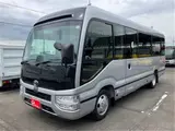2026 Toyota Coaster GX25 passenger rear double doors automatic doors navigation Silver Van for sale, Japanese used car export - photo 2 of 54 | GULJI TRADERS