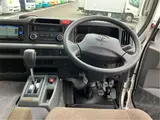 2026 Toyota Coaster GX25 passenger rear double doors automatic doors navigation Silver Van for sale, Japanese used car export - photo 3 of 54 | GULJI TRADERS