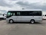 2026 Toyota Coaster GX25 passenger rear double doors automatic doors navigation Silver Van for sale, Japanese used car export - photo 6 of 54 | GULJI TRADERS