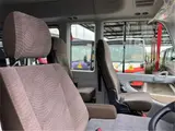 2026 Toyota Coaster GX25 passenger rear double doors automatic doors navigation Silver Van for sale, Japanese used car export - photo 35 of 54 | GULJI TRADERS