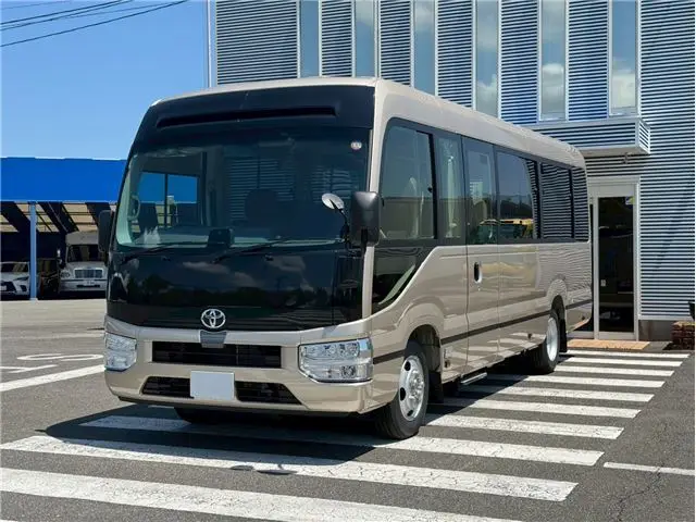 2026 Toyota Coaster EX Brown Van for sale, Japanese used car export | GULJI TRADERS