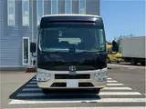 2026 Toyota Coaster EX Brown Van for sale, Japanese used car export - photo 2 of 74 | GULJI TRADERS