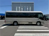 2026 Toyota Coaster EX Brown Van for sale, Japanese used car export - photo 5 of 74 | GULJI TRADERS