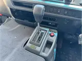 2026 Toyota Coaster EX Brown Van for sale, Japanese used car export - photo 45 of 74 | GULJI TRADERS
