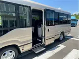 2026 Toyota Coaster EX Brown Van for sale, Japanese used car export - photo 51 of 74 | GULJI TRADERS