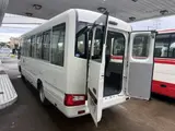 2026 Toyota Coaster Unused 25-seater LX Long rear double doors automatic transmission reclining seats White Van for sale, Japanese used car export - photo 1 of 38 | GULJI TRADERS