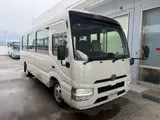2026 Toyota Coaster Unused 25-seater LX Long rear double doors automatic transmission reclining seats White Van for sale, Japanese used car export - photo 2 of 38 | GULJI TRADERS
