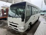 2026 Toyota Coaster Unused 25-seater LX Long rear double doors automatic transmission reclining seats White Van for sale, Japanese used car export - photo 4 of 38 | GULJI TRADERS