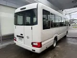 2026 Toyota Coaster Unused 25-seater LX Long rear double doors automatic transmission reclining seats White Van for sale, Japanese used car export - photo 5 of 38 | GULJI TRADERS