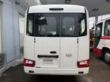 2026 Toyota Coaster Unused 25-seater LX Long rear double doors automatic transmission reclining seats White Van for sale, Japanese used car export - photo 9 of 38 | GULJI TRADERS