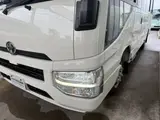 2026 Toyota Coaster Unused 25-seater LX Long rear double doors automatic transmission reclining seats White Van for sale, Japanese used car export - photo 12 of 38 | GULJI TRADERS