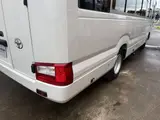 2026 Toyota Coaster Unused 25-seater LX Long rear double doors automatic transmission reclining seats White Van for sale, Japanese used car export - photo 14 of 38 | GULJI TRADERS