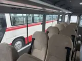 2026 Toyota Coaster Unused 25-seater LX Long rear double doors automatic transmission reclining seats White Van for sale, Japanese used car export - photo 17 of 38 | GULJI TRADERS