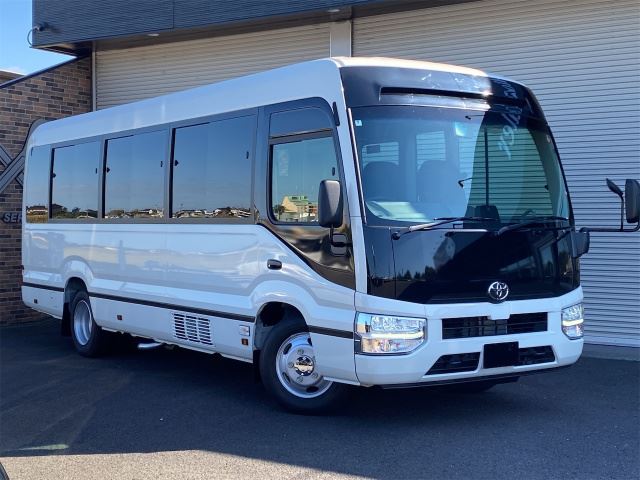 2026 Toyota Coaster Sedan for sale, Japanese used car export - photo 1 of 33 | GULJI TRADERS
