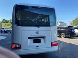 2026 Toyota Coaster Sedan for sale, Japanese used car export - photo 3 of 33 | GULJI TRADERS