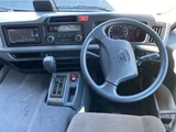 2026 Toyota Coaster Sedan for sale, Japanese used car export - photo 21 of 33 | GULJI TRADERS