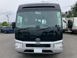2026 Toyota Coaster GX Silver Van for sale, Japanese used car export - photo 2 of 30 | GULJI TRADERS