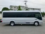 2026 Toyota Coaster GX Silver Van for sale, Japanese used car export - photo 4 of 30 | GULJI TRADERS
