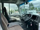 2026 Toyota Coaster GX Silver Van for sale, Japanese used car export - photo 9 of 30 | GULJI TRADERS