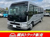 2026 Toyota Coaster GX Sedan for sale, Japanese used car export - photo 1 of 30 | GULJI TRADERS