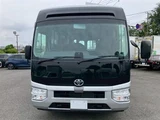 2026 Toyota Coaster GX Sedan for sale, Japanese used car export - photo 2 of 30 | GULJI TRADERS