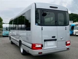 2026 Toyota Coaster GX Sedan for sale, Japanese used car export - photo 7 of 30 | GULJI TRADERS
