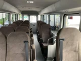 2026 Toyota Coaster GX Sedan for sale, Japanese used car export - photo 23 of 30 | GULJI TRADERS