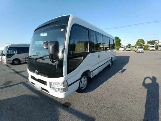 2026 Toyota Coaster GX White Van for sale, Japanese used car export | GULJI TRADERS