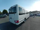 2026 Toyota Coaster GX White Van for sale, Japanese used car export - photo 2 of 10 | GULJI TRADERS