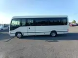 2026 Toyota Coaster GX White Van for sale, Japanese used car export - photo 4 of 10 | GULJI TRADERS