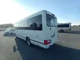 2026 Toyota Coaster GX White Van for sale, Japanese used car export - photo 6 of 10 | GULJI TRADERS