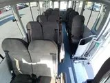 2026 Toyota Coaster GX White Van for sale, Japanese used car export - photo 10 of 10 | GULJI TRADERS