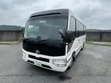 2026 Toyota Coaster GX 29-seater new model White Van for sale, Japanese used car export - photo 1 of 9 | GULJI TRADERS