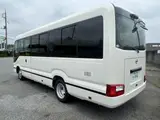 2026 Toyota Coaster GX 29-seater new model White Van for sale, Japanese used car export - photo 2 of 9 | GULJI TRADERS