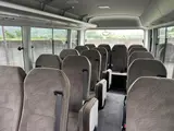 2026 Toyota Coaster GX 29-seater new model White Van for sale, Japanese used car export - photo 7 of 9 | GULJI TRADERS