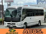 2026 Toyota Coaster Long LX Turbo White Van for sale, Japanese used car export - photo 1 of 9 | GULJI TRADERS