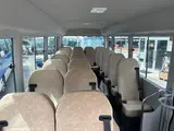 2026 Toyota Coaster Long LX Turbo White Van for sale, Japanese used car export - photo 7 of 9 | GULJI TRADERS