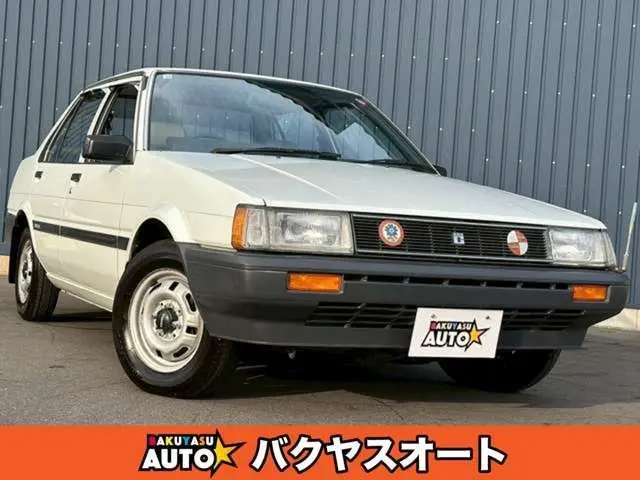 1983 Toyota Corolla 1.5 GL - photo 1 1983 Toyota Corolla 1.5 GL White Sedan for sale, Japanese used car export - photo 1 of 42 | GULJI TRADERS