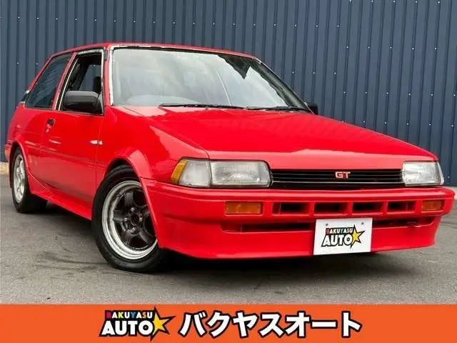 1985 Toyota Corolla FX Red Color changed Sedan for sale, Japanese used car export - photo 1 of 45 | GULJI TRADERS