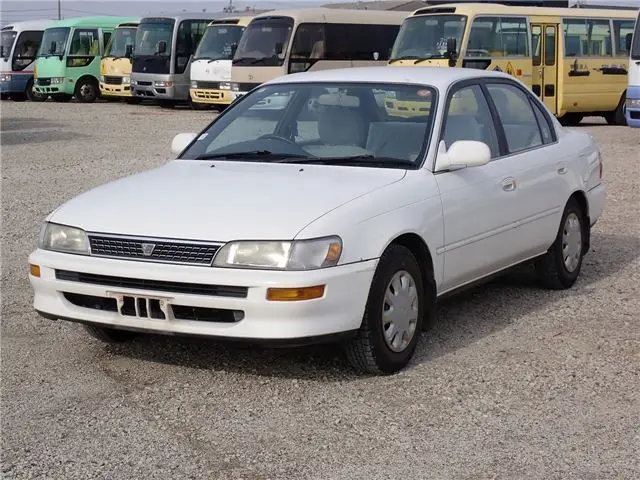 1994 Toyota Corolla XE White Sedan for sale, Japanese used car export - photo 1 of 80 | GULJI TRADERS