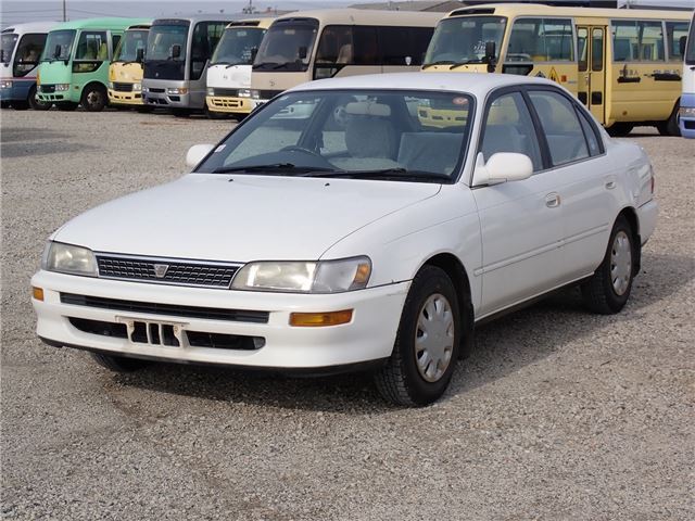 1994 Toyota Corolla XE - photo 1 1994 Toyota Corolla XE White Sedan for sale, Japanese used car export | GULJI TRADERS