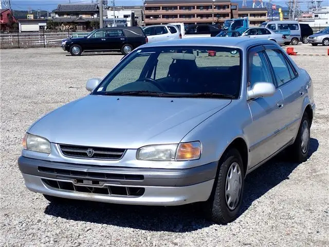 1997 Toyota Corolla XE Saloon 4WD - photo 1 1997 Toyota Corolla XE Saloon 4WD Silver Sedan for sale, Japanese used car export - photo 1 of 73 | GULJI TRADERS