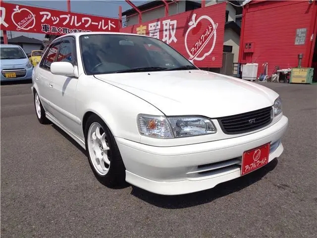 1998 Toyota Corolla GT ★ 6-speed manual transmission ★ Recaro seats ★ Adjustable suspension ★ A'PEXi muffler - photo 1 1998 Toyota Corolla GT ★ 6-speed manual transmission ★ Recaro seats ★ Adjustable suspension ★ A'PEXi muffler White Sedan for sale, Japanese used car export - photo 1 of 68 | GULJI TRADERS