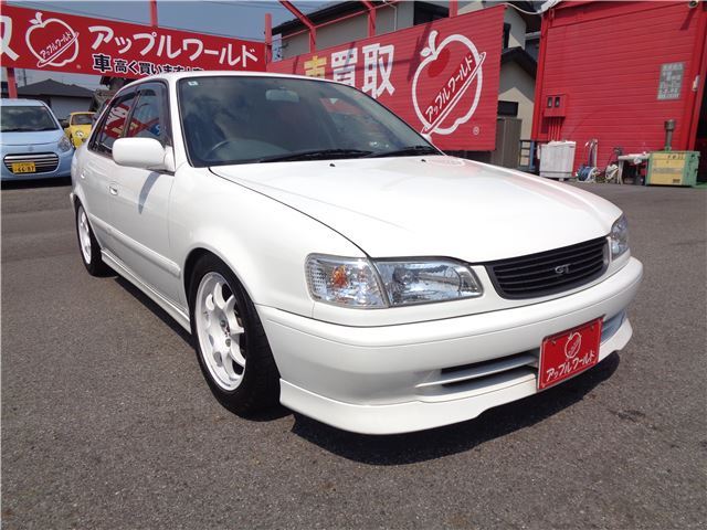 1998 Toyota Corolla GT ★ 6-speed manual transmission ★ Recaro seats ★ Adjustable suspension ★ A'PEXi muffler White Sedan for sale, Japanese used car export | GULJI TRADERS