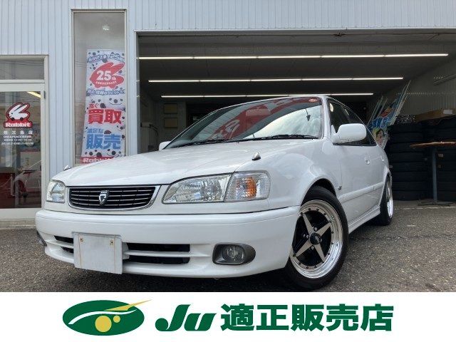 1998 Toyota Corolla GT 6-speed manual transmission, Equip alloy wheels White Sedan for sale, Japanese used car export | GULJI TRADERS