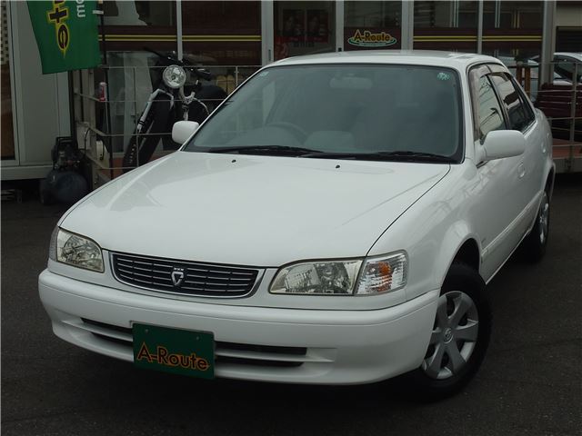 1999 Toyota Corolla XE Saloon Limited - photo 1 1999 Toyota Corolla XE Saloon Limited White Sedan for sale, Japanese used car export | GULJI TRADERS