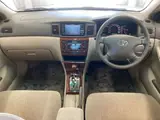 2001 Toyota Corolla Luxel Navi Edition Green Sedan for sale, Japanese used car export - photo 2 of 5 | GULJI TRADERS