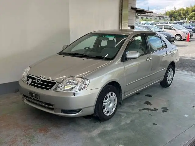 2002 Toyota Corolla G Limited - photo 1 2002 Toyota Corolla G Limited Silver Sedan for sale, Japanese used car export - photo 1 of 8 | GULJI TRADERS