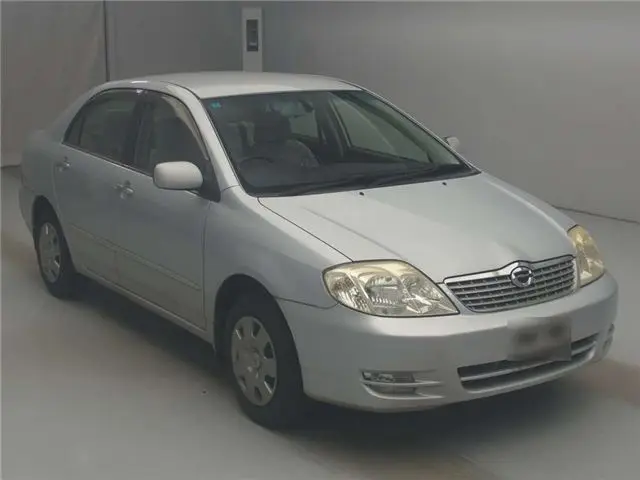 2004 Toyota Corolla Luxel - photo 1 2004 Toyota Corolla Luxel Silver Sedan for sale, Japanese used car export - photo 1 of 11 | GULJI TRADERS